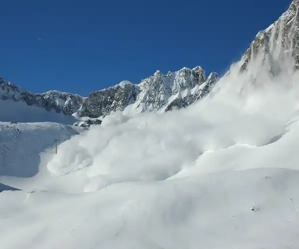 snow avalanche in mountains